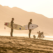 Surfers in Cofete