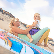 Family surf camp, mum and daughter at the beach