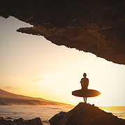 Surfer girls enjoying the sunset in La Pared