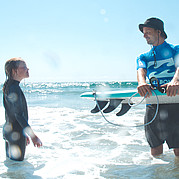 Surf dad with surf daughter