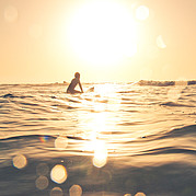 little surfer waits for the next wave