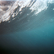 Sunrays through wave