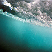Surfing, wave from below