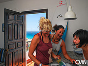 surf camp participants meet to have dinner together